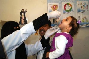 A Yemeni child receives oral polio vaccine during the November vaccination round. WHO