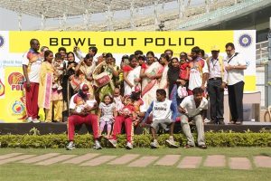 Cricketers are the main attraction at the launch of a polio vaccination round in November Tom Moran / WHO