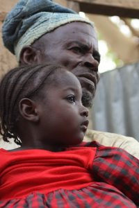 Aisha with her grandfather Muhammad Bello UNICEF/ Andriamasinoro