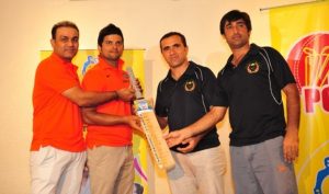India and Afghanistan team members swapping signed bats to support the eradication of polio from the region. UNICEF