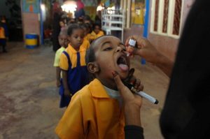 Children line up for oral polio vaccine at a school in Sudan. Johann Hattingh/UNMIS