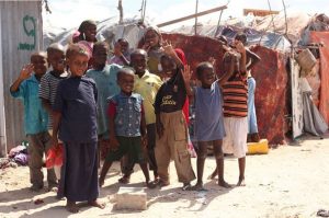 Children in Mogadishu greet vaccinators responding to a polio outbreak. WHO/T.Moran