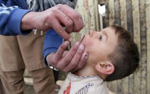 A child is vaccinated with an oral poliovirus vaccine. WHO/Afghanistan