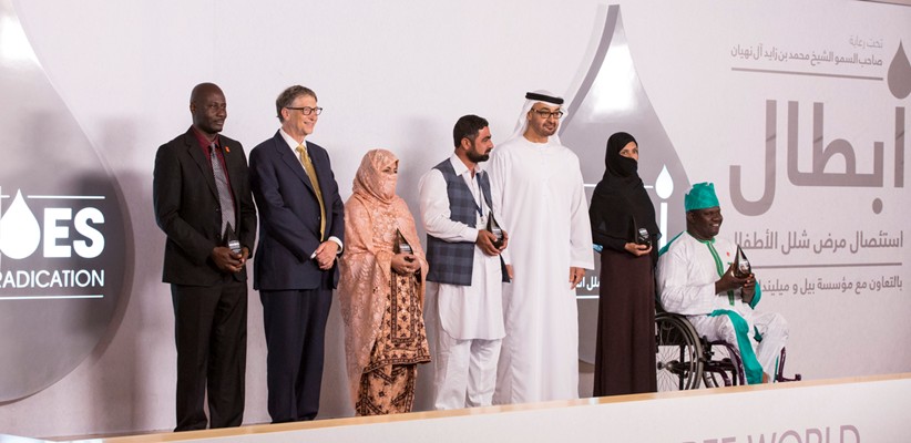 ABU DHABI, UNITED ARAB EMIRATES - December 6, 2015: Bill Gates, Co-chair, Bill & Melinda Gates Foundation (2nd L), and HH Sheikh Mohamed bin Zayed Al Nahyan, Crown Prince of Abu Dhabi and Deputy Supreme Commander of the UAE Armed Forces (5th L), stand for a photograph with winners of the Heroes of Polio Eradication (HOPE) awards during the HOPE awards ceremony at Al Mamoura. Seen with Constant Dedo, a polio consultant with the World Health Organization (L), Freeda, a health worker in Baluchistan, Pakistan (3rd L), Atta Ullah, Chairman of a local support organization in Khyber Pakhtunkwa, Pakistan (4th L), Bibi Malika, a polio worker in Helmand, Afghanistan (6th L), and Lawan Didi Misbahu, Chairman of the Association of Polio Survivors of Nigeria and President of the Para-Soccer Federation of Nigeria (7th L)