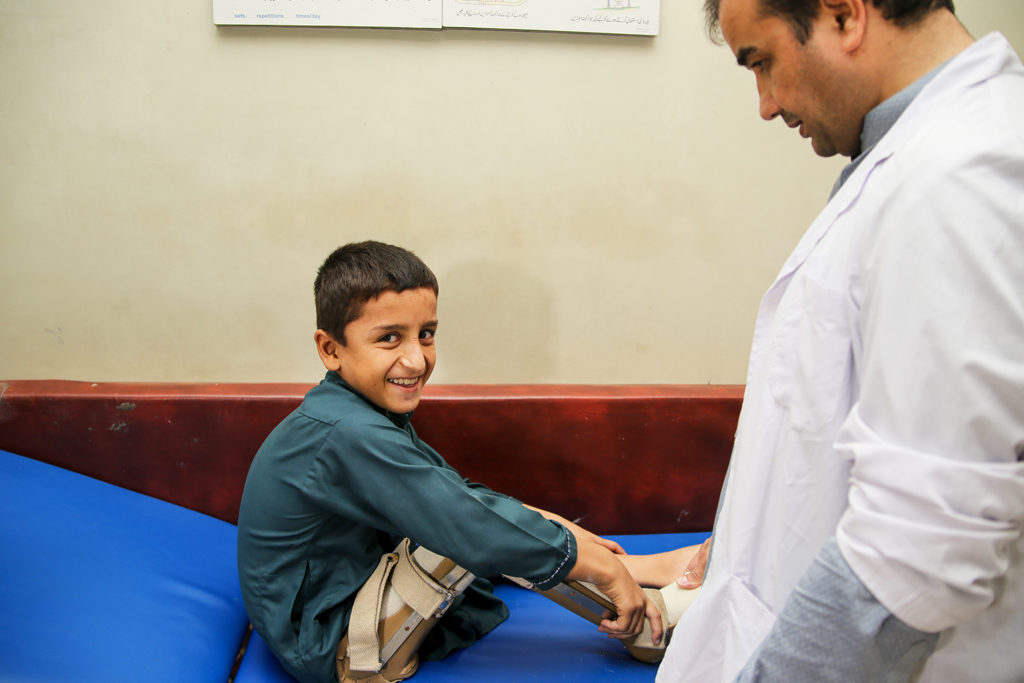 Adil Khan is getting his orthotic device replaced at PIPOS, Peshawar.