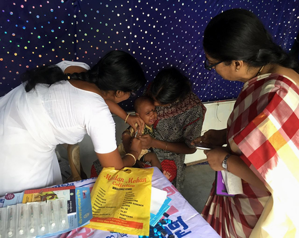 A child is vaccinated with fIPV during a campaign in Hyderabad, India. © WHO/Harish Verma