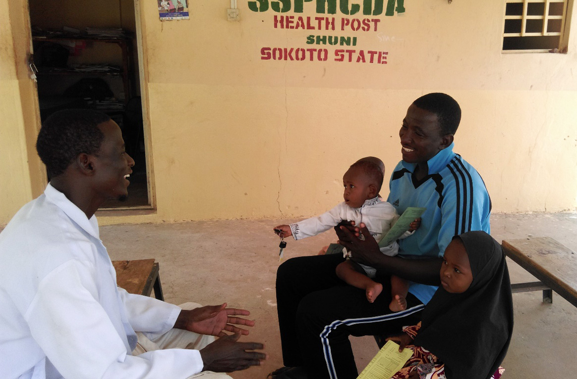 Thanks to the efforts of Hauwa, a UNICEF community mobilizer, Nasiru has taken responsibility for ensuring that all his children receive their polio and other routine vaccinations. © UNICEF/Nigeria