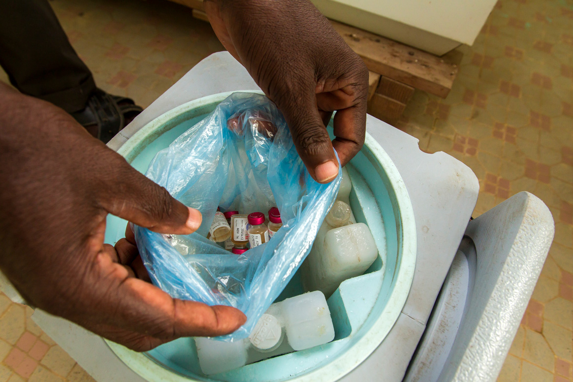 Ready for a long day—vaccines are put in cold boxes as a part of the cold chain to reach as many children as possible in the door-to-door vaccination campaigns. © Rotary International. 