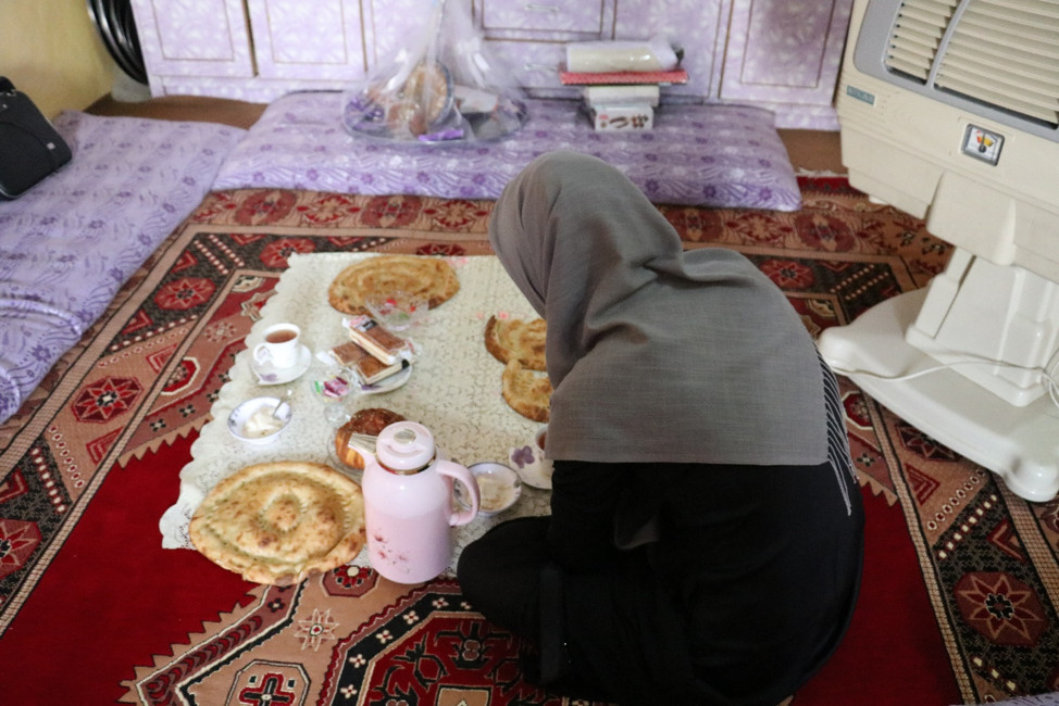 Dr Elaha prepares to head out for the day to educate communities on polio and COVID-19. ©WHO/Afghanistan 