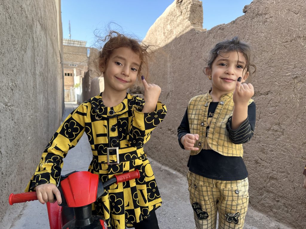 Children in Helmand, Afghanistan, show their inked fingers—a sign they have been vaccinated against polio. © WHO/Afghanistan